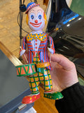 Wind up tin clown drummer