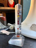Vintage Soviet plexiglass lighthouse souvenir, full view on shelf