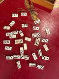 Full set of Napoleonic prisoner of war miniature bone dominoes laid out