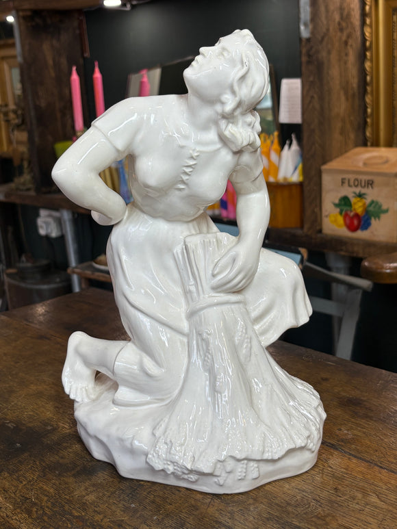 White Soviet porcelain figure of woman kneeling peasant woman with sheaf, Gorodnitsa Factory, 1950s-60s
