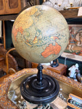 Antique Philip's terrestrial globe turned to show China, Southeast Asia and Australia, with the British Empire coloured red