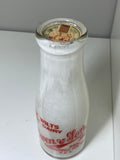 Old shop display milk bottle