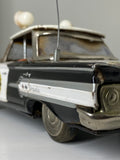 Mid century Ichiko Chevrolet Impala toy police car