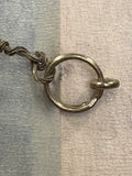 Close-up of frame hanging wire and ring fitting