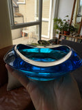 Union Sklo glass bowl by window showing blue glass tone