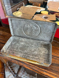 Interior of Boer War chocolate tin, open lid showing embossed portrait