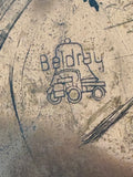 	Close-up of impressed Beldray trademark with bell on a dray truck logo on vase base
