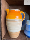 Vintage Shelley Harmony Ware jug with orange graduated drip glaze, England