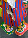 Wind up tin clown drummer