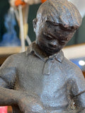 Mid century Soviet statue of young boy