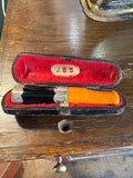 Cheroot holder displayed in open case with JBB label