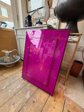 Back view of 'Only Me' Kartell mirror by Philippe Starck in fuchsia