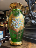 Hand-painted floral detail on emerald and gilt vintage glass vase