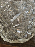 Close-up of detail of faceted cut glass body of 1920s glass scent bottle
