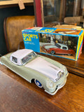 Lucky Sports Car friction toy with original box, angled front view