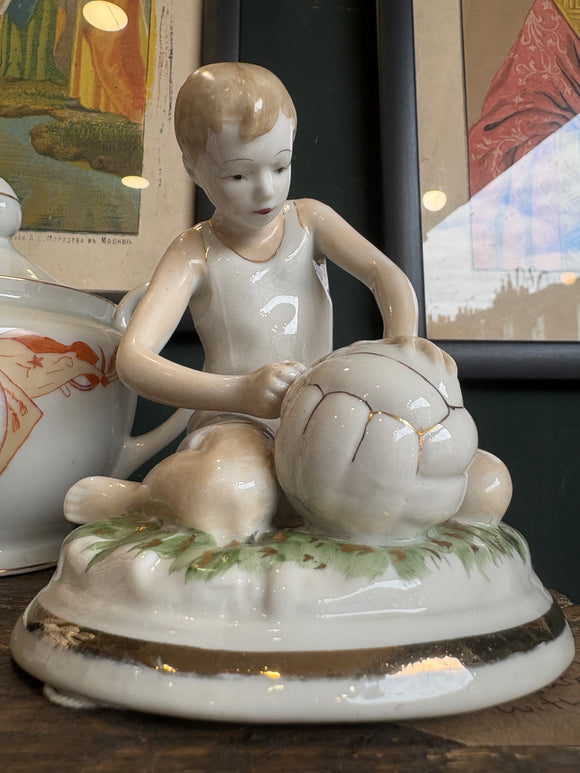 Mid-Century Russian Porcelain Figurine – Boy with Football – Chudovo Factory – 14cm High