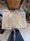 Daily Mail War Map fully opened on chair seat
