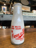 Old shop display milk bottle