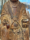 Carved robe lapels, clasp and hands holding objects on antique Chinese figure