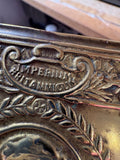 Close-up of Imperium Britannicum lettering on tin border