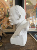 Side view of vintage Lenin bust showing stamped date and signature