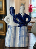 Rear view of vintage Gzhel porcelain women figurine