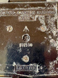 Close-up of serial number stamped on compass base