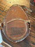 Brass Verner's Pattern compass, closed, inside open leather case, with maker's mark and 1917 date visible on base