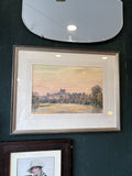 Framed watercolour Dawn at Windsor hanging on wall beneath mirror