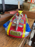 Vintage tin space rocket car