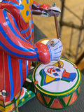 Wind up tin clown drummer