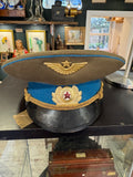 Front of a Soviet Air Force officer's cap showing the winged star badge, wreathed cockade and black peak