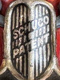 Close-up of SCHUCO PATENT grille badge