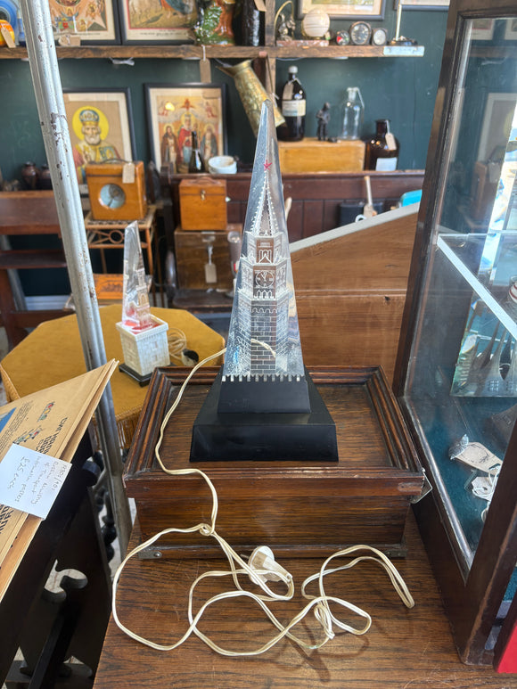1970s Soviet night light with etched plexiglass Kremlin tower on black base. 