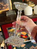 Handheld view showing scale of Victorian glass candlestick