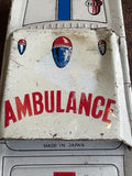 Close-up of Ambulance roof sign with Made in Japan marking on vintage Japanese tinplate toy car