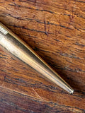 Detail of Fyne Poynt propelling pencil tip and engraved gold plated body
