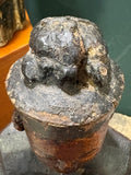 Top view of carved topknot on antique Chinese wood Guanyin figure