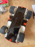 Underside of 1970s Tonka Dune Buggy showing Tonka branding.