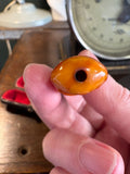 Amber-coloured mouthpiece showing 12 mm opening