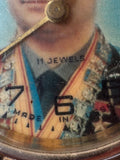 Close-up f dial reading "Made in USSR" and "11 jewels"