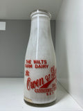 Old shop display milk bottle