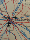 Close-up of vintage educational map of France showing Paris and air routes