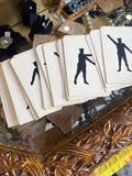 Semaphore flash cards fanned out on shop counter