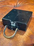WWII British Army magnetic marching compass by T.G. Co. Ltd, closed, showing brass hinged case
