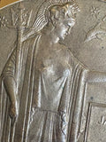 Close-up of Britannia figure on WWI memorial plaque