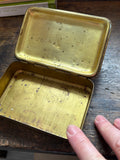 Open Princess Mary brass tin showing empty interior