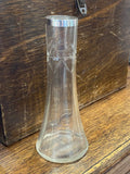 Glass bud vase with silver collar