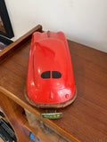 Top view of 1950s Gescha red tin Porsche 356 toy car showing roofline and rear window