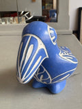 Angled view of 1970s blue and white ceramic bird by Pablo Zabal